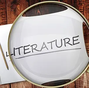 Image illustrating a simple literature review, symbolizing the foundational step in academic research. Relevant for those seeking dissertation support and guidance in the literature review process.